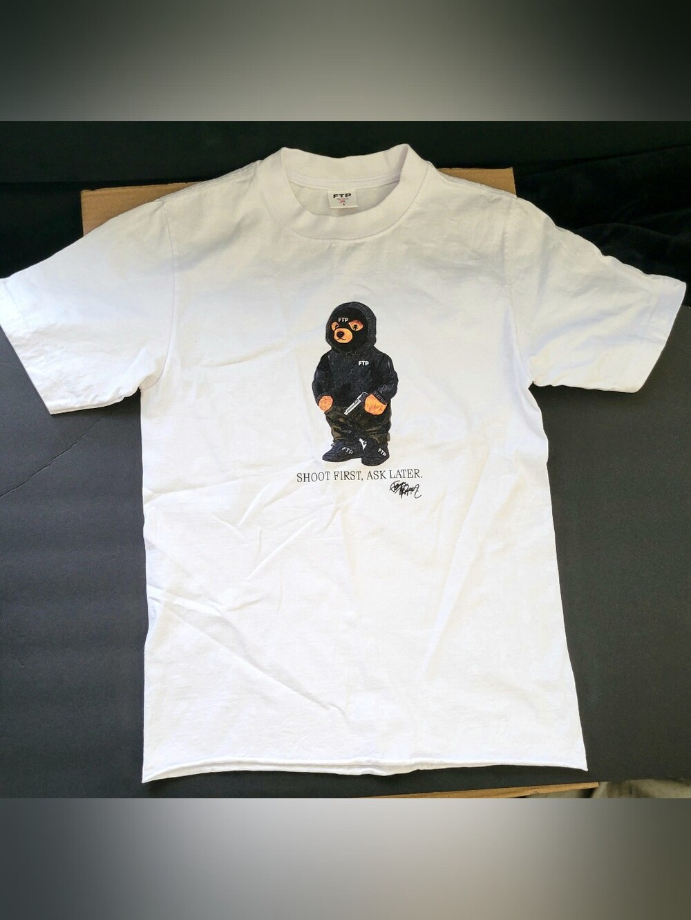FTP White Tee with Black Hooded Bear Graphic and Orange Accents